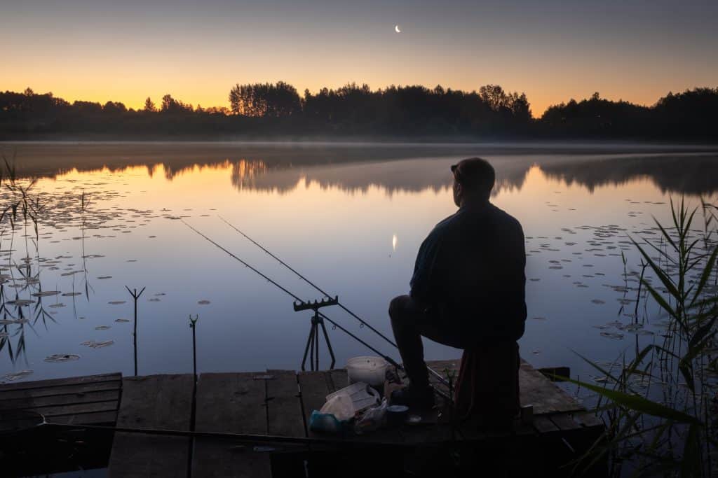 Fisherman trying to catch white bass at night